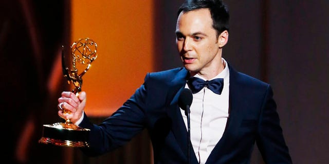 Jim Parsons accepts the award for Outstanding Lead Actor In A Comedy Series for his role in "The Big Bang Theory" at the 65th Primetime Emmy Awards in Los Angeles September 22, 2013. REUTERS/Mike Blake (UNITED STATES - Tags: ENTERTAINMENT) (EMMYS-SHOW) - RTX13VVS