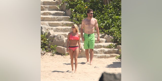 Exclusive... 52114060 Singer Carrie Underwood and her husband, Mike Fisher are seen vacationing in Cabo, Mexico on July 6, 2016. The couple was seen relaxing and soaking in the rays before dipping their feet into the ocean water. ***NO USE W/O PRIOR AGREEMENT-CALL FOR PRICING*** FameFlynet, Inc - Beverly Hills, CA, USA - +1 (310) 505-9876
