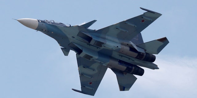 A Russian Sukhol Su-30SM fighter performs during a demonstration outside Moscow.