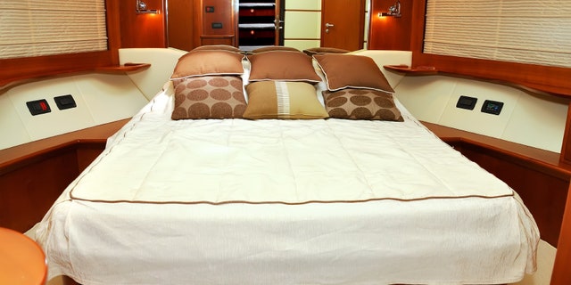 white bedroom motor yacht, close up