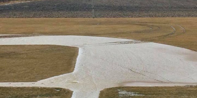Tire track damage can be seen on the "Field of Dreams" movie site in Dyersville, Iowa