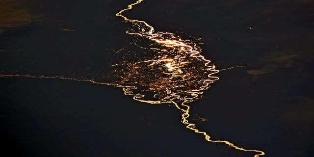 Astronaut Jack Fischer tweeted an fantastic image of the Cuando and Zambesi rivers with the sun glinting off them creating a stunning fiery reflection.