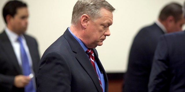 Feb. 21, 2013: In this file photo, Former Fiesta Bowl CEO John Junker appears in Maricopa County Superior Court in Phoenix, Ariz.
