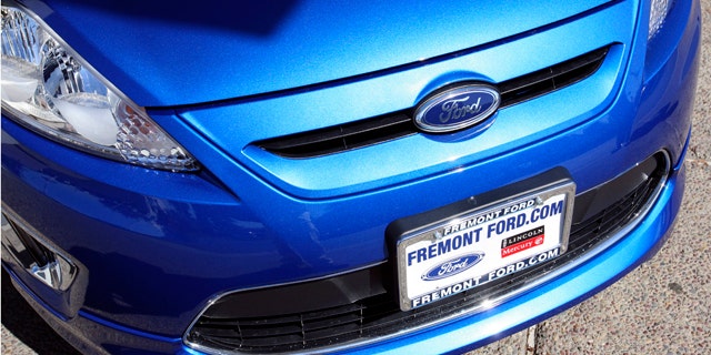 FILE - In this Sept. 28, 2010 file photo, a 2011 Ford Fiesta vehicle is shown for sale at Fremont Ford in Newark, Calif. "With gasoline prices eclipsing $3.90 a gallon, consumers are placing an even higher priority on fuel efficiency in every size and kind of vehicle," said Ken Czubay, Ford vice president, U.S. Marketing, Sales and Service. (AP Photo/Ben Margot)