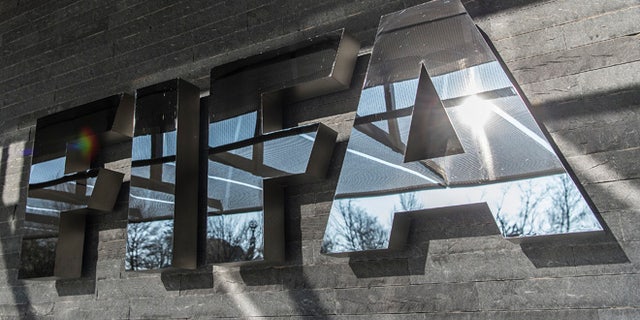 ZURICH, SWITZERLAND - MARCH 18: A FIFA sign at the entrance of its headquarters on March 18, 2016 in Zurich, Switzerland. (Photo by Valeriano Di Domenico/Getty Images)