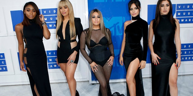Fifth Harmony member Lauren Jauregui (far right) has come out as bisexual and criticized Trump supporters.