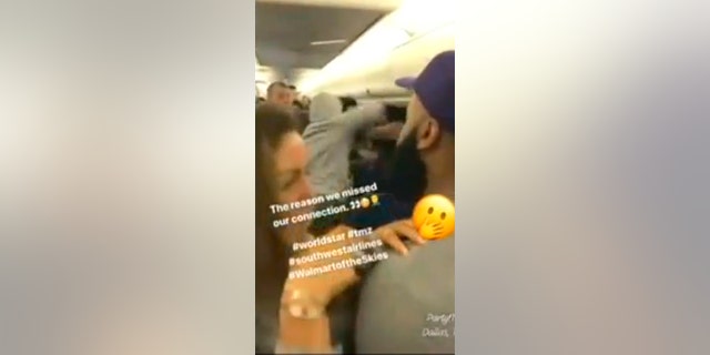 The man then spat on the other passenger, apparently sparking the altercation.