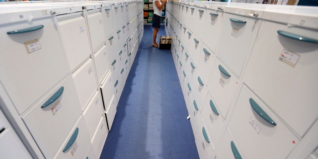 Australian officials are investigating how top-secret documents were left in filing cabinets that were sold at a second-hand shop.