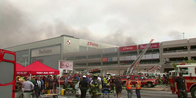Multiple cars were ablaze at a parking garage in Kings Plaza Shopping Mall in Brooklyn.