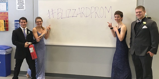 Embracing the opportunity, the teens happily posed in their glitzy gowns and tuxedos at the station.