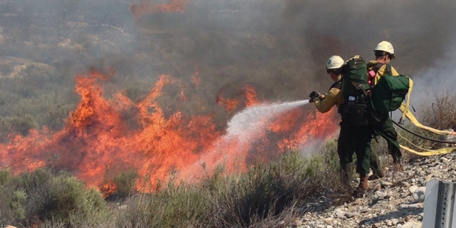 Apr. 30, 2014: Firefighters battle wildfire in Southern California.