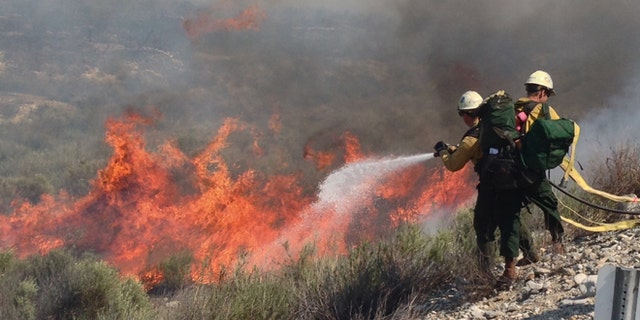 Apr. 30, 2014: Firefighters battle wildfire in Southern California.