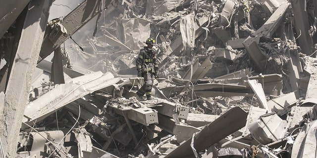 A FDNY firefighter working at Ground Zero after the Sept. 11, 2001 terror attacks.