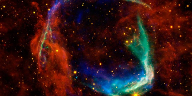 This image combines data from four different space telescopes to create a multi-wavelength view of all that remains of the oldest documented example of a supernova, called RCW 86. The Chinese witnessed the event in 185 A.D., documenting a mysterious "guest star" that remained in the sky for eight months.