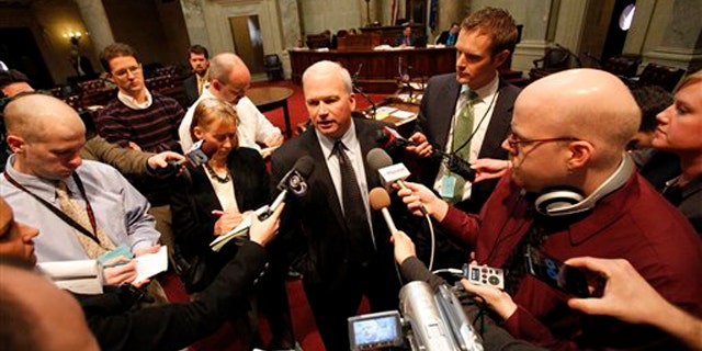 FILE: State Senate Majority Leader Scott Fitzgerald addresses the media on the Senate floor in Madison, Wis., Feb. 18.