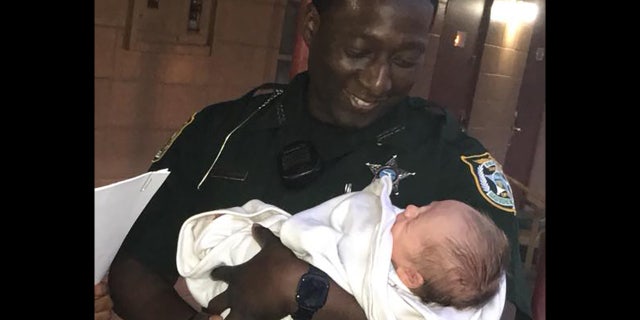 Gadsen County sheriff's Deputy Vontez Jackson was praised for helping find the infant.