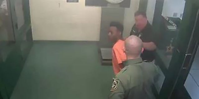 O'Neal being booked at Hillsborough County Jail.
