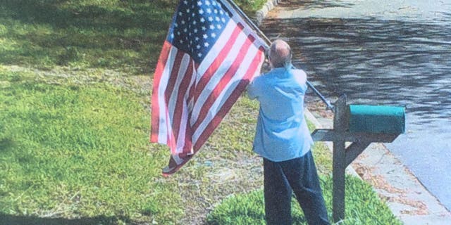 Anderson submitted evidence showing Parmele taking the flag.