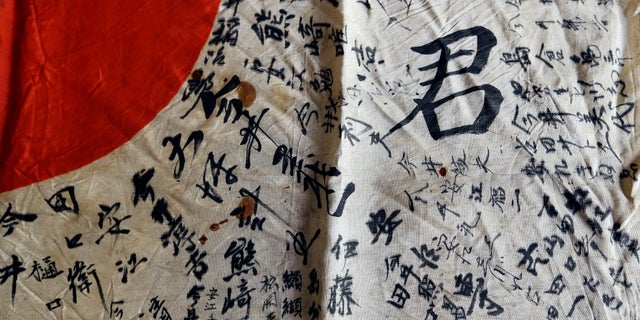 The flag contained names of the dead Japanese soldier's relatives and neighbors.
