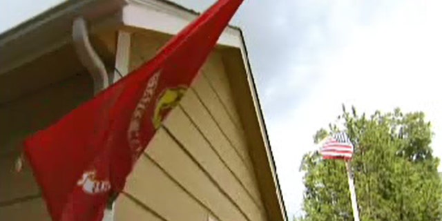 Howard Banks says vandals have previously shredded his United States and Marine Corps flags outside his Texas home.