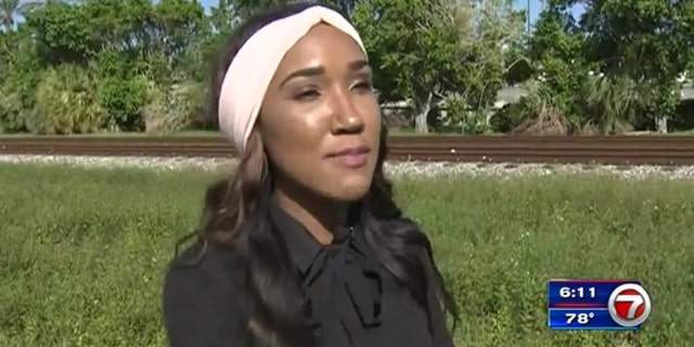 Natalie Grant said she sitting in her car nearby as Flescher's car was stuck on train tracks.