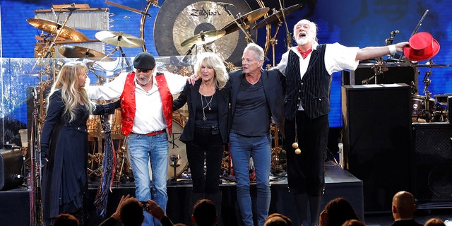 Honorees Stevie Nicks, John McVie, Christine McVie, Lindsey Buckingham, and Mick Fleetwood of the group Fleetwood Mac react after performing during the 2018 MusiCares Person of the Year show honoring Fleetwood Mac at Radio City Music Hall in Manhattan, New York, U.S., January 26, 2018. Recently, the band announced it was losing Buckingham.