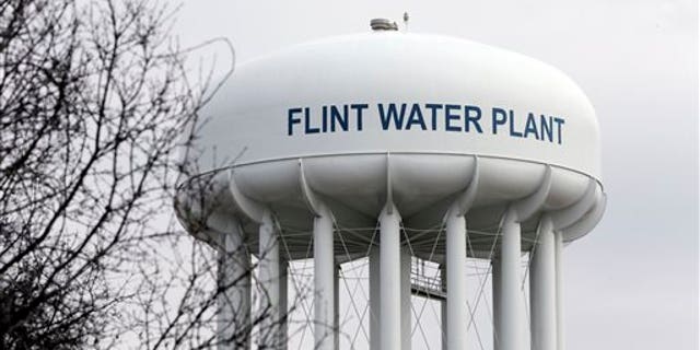The Flint Water Plant tower in Flint, Mich., is seen on Feb. 5, 2016. (AP Photo/Carlos Osorio, File)