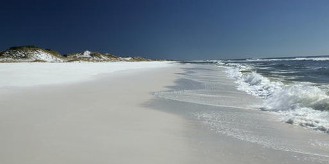 This undated photo provided by Visit South Walton shows Grayton Beach on Florida's Panhandle on the Gulf Coast. Grayton Beach State Park is No. 6 on the list of top beaches for the summer of 2016 as compiled by Stephen Leatherman, also known as Dr. Beach, a professor at Florida International University. (David Bailey Photography/Visit South Walton via AP)