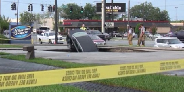 A sinkhole in Marion County swallowed a car, according to the Ocala Fire Department.