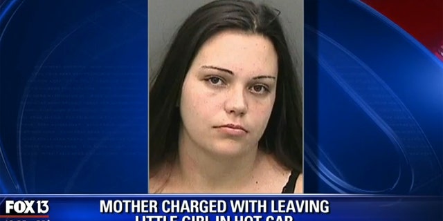 Police arrested a Tampa mother who allegedly left a baby in a hot car while she went into the courthouse to pay a fine.