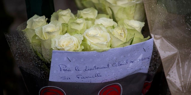 People brought flowers to the police station in memory of Lt. Col. Arnaud Beltrame.