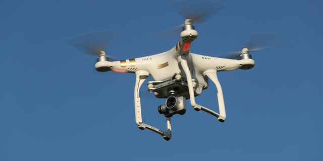 BRUECK, GERMANY - JUNE 08: The photographer's DJI Phantom 3 Pro multirotor drone flies on June 8, 2016 near Brueck, Germany. Countries across Europe are debating legislation to regulate the use of consumer drones. As prices have come down and piloting simplified the market for consumer-oriented drones has risen dramatically with sales of hundreds of thousands of drones expected for coming years. (Photo by Sean Gallup/Getty Images)