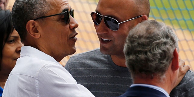 FILE 2016: Former New York Yankee Derek Jeter meets with President Obama in Havana.