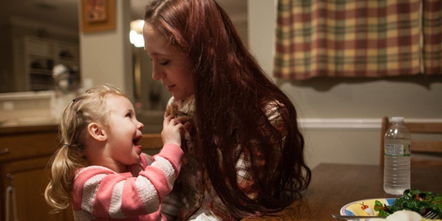 Jan. 25, 2014: Maggie Barcellano with daughter Zoe, 3, at her father's house in Austin, Texas.