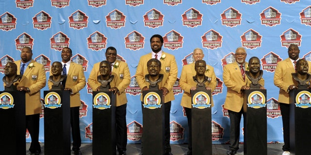 Aug. 3, 2013: Hall of Fame inductees, from left, Larry Allen, Cris Carter, Dave Robinson, Jonathan Ogden, Bill Parcells, Curley Culp and Warren Sapp pose with their bronze busts during the 2013 Pro Football Hall of Fame Induction Ceremony in Canton, Ohio.
