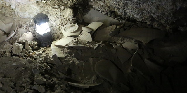 Fragments of jars that contained stolen scrolls.