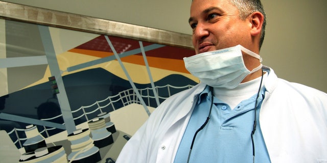 May 16, 2009: Dutch dentist, Jacobus Van Nierop, is pictured in his dental office in Chateau-Chinon, France. A French court found a Dutch dentist guilty of assault and fraud Tuesday and sentenced him to eight years in prison. (AP)