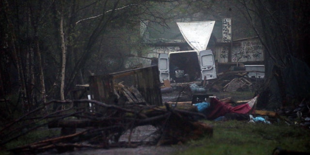 Debris blocks a road at the start of a police evacuation operation in Notre-Dame-des-Landes.