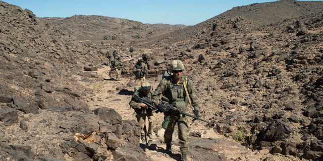 March 8, 2013: In this photo taken by the French Army Communications Audiovisual office (ECPAD) shows French soldiers patrolling in the Mettatai region in northern Mali.