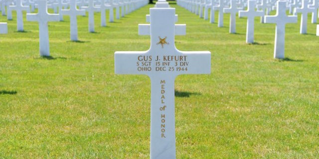 The headstone of Medal of Honor recipient Staff Sgt. Gus J. Kefurt, a soldier assigned to the 15th Infantry Regiment, 3rd Infantry Division and a native of Youngstown, Ohio, stands among the 5,255 other Soldiers buried at Epinal American Cemetery in France. (www.army.mil)