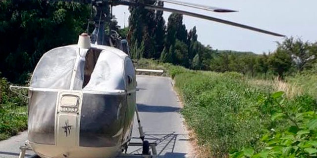 This photo taken on Sunday, July 1, 2018 and provided on Monday, July 2, 2018 by the AP on the condition that its source not be revealed shows an helicopter abandoned by notorious French criminal Redoine Faid after his escape from a prison, in Gonesse, north of Paris, France.