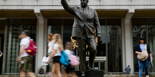 Shown is a statue of the late Philadelphia Mayor Frank Rizzo, who also served as the city's police commissioner, outside the Municipal Services Building in Philadelphia, Tuesday, Aug. 15, 2017.