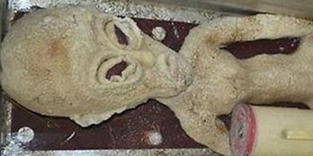 A man claims he saw UFOs buzzing across the night sky along the Yellow River in Binzhou Shangdong province and transferred the remains of one alien to his home freezer.