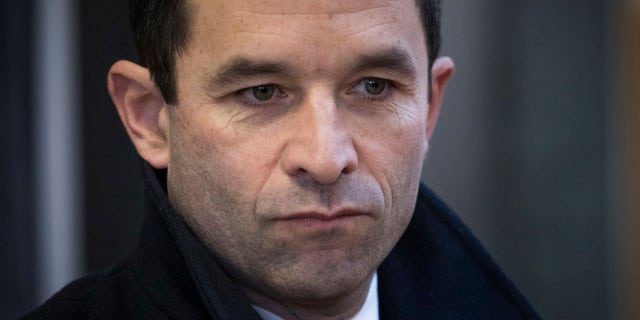Jan. 29, 2017: Benoit Hamon, a candidate for the French left's presidential nomination, looks on before voting as part of the second round of the primaries in Trappes, west of Paris