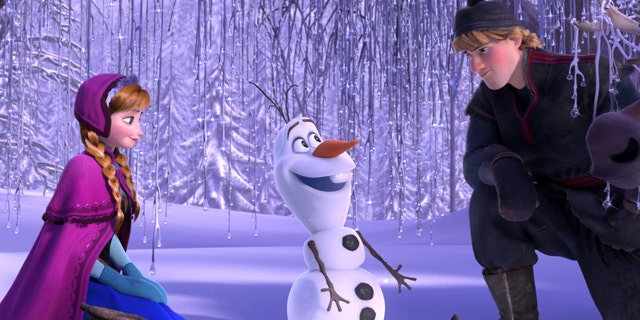 This image released by Disney shows , from left, Anna, voiced by Kristen Bell, Olaf, voiced by Josh Gad, and Kristoff, voiced by Jonathan Groff in a scene from the animated feature "Frozen."