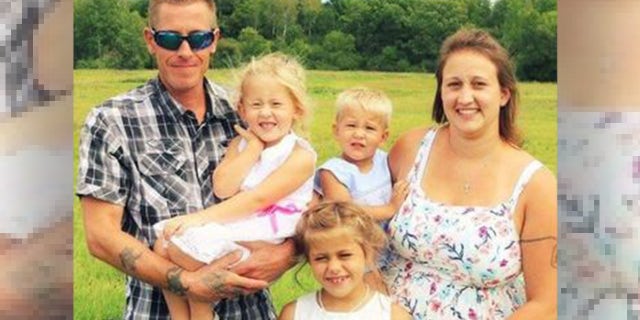 Erik Fryman, Cari Mews and their three children.