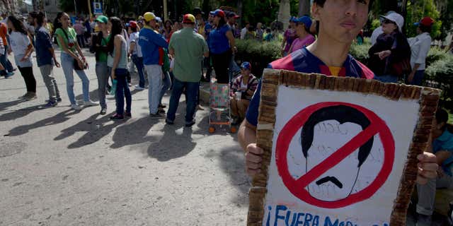A protest against President Nicolas Maduro, in Merida, Venezuela, Wednesday, Sept. 7, 2016.
