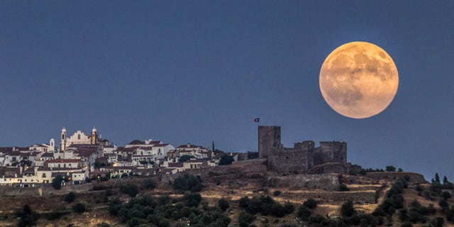Photographer Miguel Claro snapped this photograph of a full moon over Monsaraz from Portugal's Dark Sky Alqueva Reserve Aug. 29.