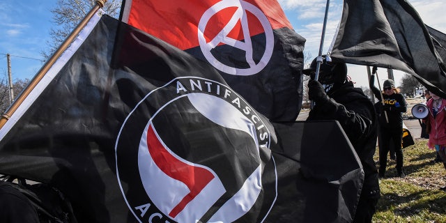 Ten anti-fascist protesters were arrested at a neo-Nazi rally in Georgia after some refused to remove the masks they were wearing at the demonstration.