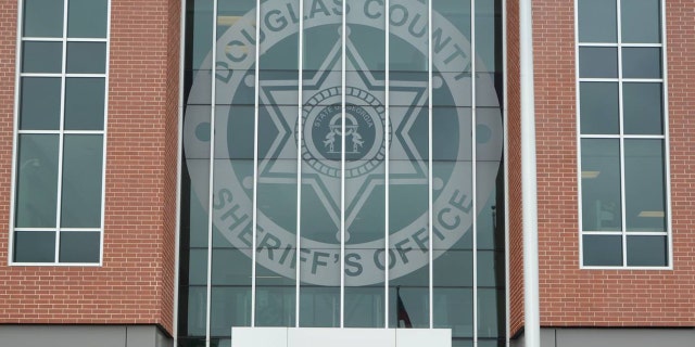 A Douglas County sheriff's deputy was stabbed in the building's bathroom Tuesday.